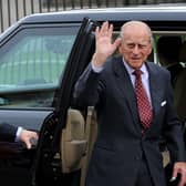 Prince Philip waves to well-wishers during a visit to Crumlin Road jail in June 2014. 

Picture - Kevin Scott / Presseye