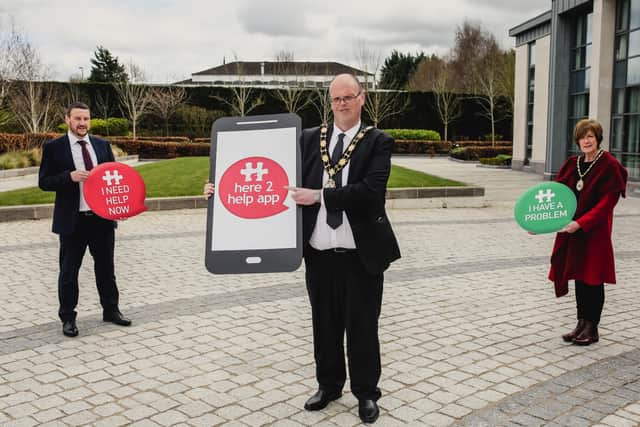 Mayor of Antrim and Newtownabbey, Cllr Jim Montgomery along with the borough's Mental Health Champions are encouraging residents to avail of the Here2Help app.