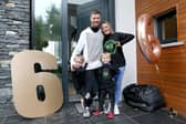 World Superbike champion, Jonathan Rea, is welcomed back  home to a huge welcome from his sons Jake and Tyler and wife Tatia after winning the title for the sixth time in Estoril, Portugal in 2020. 
 Picture: Steven Davison.
