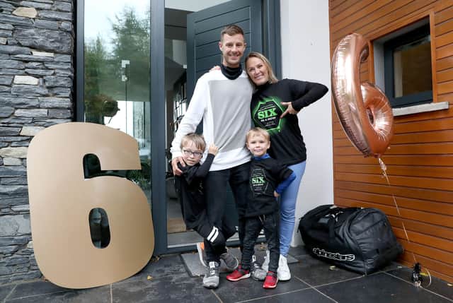 World Superbike champion, Jonathan Rea, is welcomed back  home to a huge welcome from his sons Jake and Tyler and wife Tatia after winning the title for the sixth time in Estoril, Portugal in 2020.  Picture: Steven Davison.