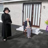 Isabelle Claypole, who celebrated her 100th birthday on April 10th 2021, receives her commemorative centenary coin from the Mayor of Causeway Coast and Glens Borough Council Alderman Mark Fielding and Mayoress Mrs Phyllis Fielding. Also included in the pictured is Lady Karen Girvan