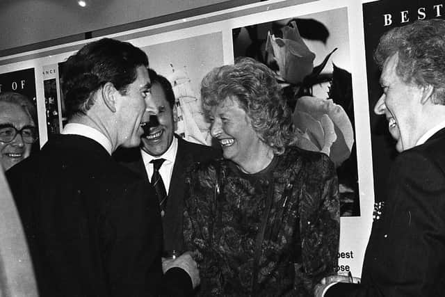 Olympic gold medalist Mary Peters shares a joke with Prince Charles during his visit to Northern Ireland in March 1991. Pictures: Trevor Dickson and Cecil McCausland/News Letter archives
