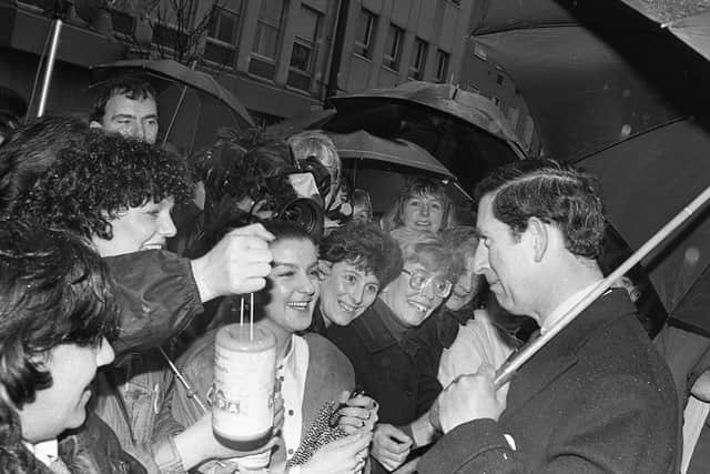 Delighted collectors from the Northern Ireland Pre-School Playgroups got a tenner from the Prince's  bodyguard during during Prince Charles's visit to Northern Ireland in March March 1991. Pictures: Trevor Dickson and Cecil McCausland/News Letter archives