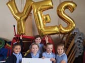 Pupils at Carrickfergus Central Primary School celebrate the results of the parental ballot which took place in June 2019.