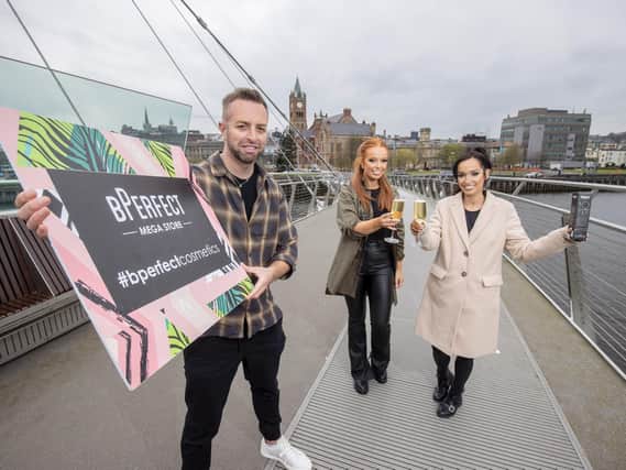 BPerfect’s Clarrisa Mallon, Brendan McDowell and Eimhear O'Kane on the Peace Bridge in Londonderry.