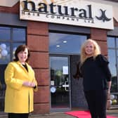 Economy Minister Diane Dodds joins Martine Broggy, owner of Natural Hair Company as she re-opens for business
