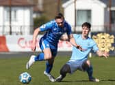 Coleraine's Matthew Shevlin tussles with Trai Hume of Ballymena United