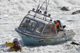 Red Bay RNLI rescue three people after fishing boat is grounded on rocks near Glenarm