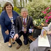Margaret Mitchel from Aghadowey, who celebrated her 100th birthday on Monday 26th April, receives a special commemorative coin from the Mayor of Causeway Coast and Glens Borough Council Alderman Mark Fielding and Mayoress Mrs Phyliss Fielding. The coins have been created as part of Causeway Coast and Glens Borough Councilâ€TMs NI 100 programme and will be presented to all residents of the Borough who turn 100 in 2021