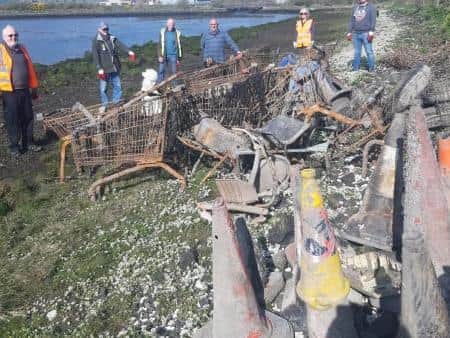 Items including shopping trolleys, road cones and tyres were pulled from the water.