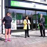 Economy Minister Diane Dodds and Lagan Valley MP Sir Jeffrey Donaldson with staff from the Running Bubble
