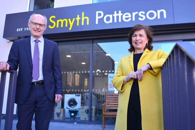 Economy Minister Diane Dodds with Colin Patterson of Smyth Patterson in Market Square
