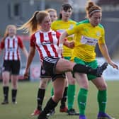 Derry City Women's Alison McGonagle tussles with Cliftonville Ladies Marissa Callaghan during Wednesday night's game at the Brandywell. Picture by John Paul McGinley/JPJPhotography
