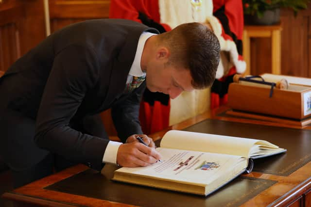 Dr Jonathan Rea MBE taking part in the special ceremony at Larne Town Hall,