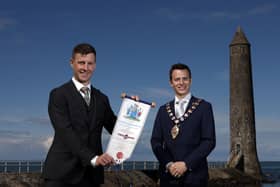 Dr Jonathan Rea MBE and the Mayor of Mid and East Antrim, Councillor Peter Johnston.