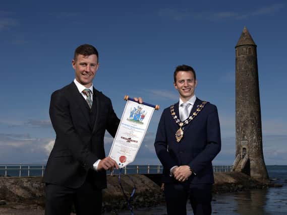 Dr Jonathan Rea MBE and the Mayor of Mid and East Antrim, Councillor Peter Johnston.