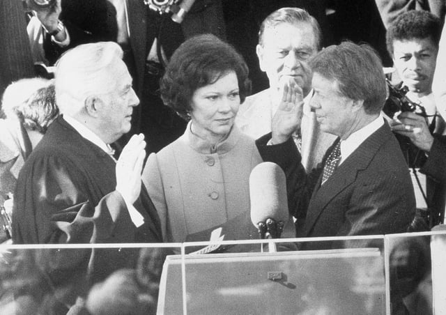 Democrat Jimmy Carter is sworn in by chief justice Earl Burger as the 39th president of the United States while first lady Rosalynn looks on, Washington DC, January 20, 1977. Picture: Hulton Archive/Getty Images