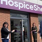 Ann Cheyne (Shop Manager), Fiona Gillespie (Shop Supervisor) and David Cox (Chair of NI Hospice Trading Board)  at the Abbots Cross store.