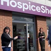 Ann Cheyne (Shop Manager), Fiona Gillespie (Shop Supervisor) and David Cox (Chair of NI Hospice Trading Board)  at the Abbots Cross store.