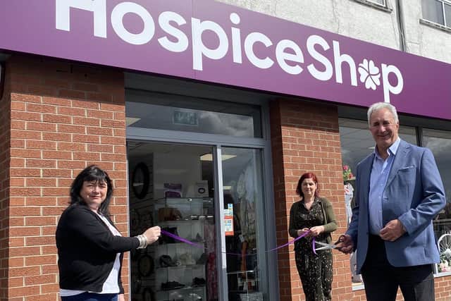 Ann Cheyne (Shop Manager), Fiona Gillespie (Shop Supervisor) and David Cox (Chair of NI Hospice Trading Board)  at the Abbots Cross store.