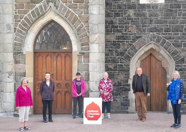 June Butler MBE being welcomed to Holy Trinity in Portrush