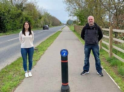 Mid Ulster MLA Emma Sheerin with Councillor Donal McPeake who are demanding lights on the Magherafelt Road, Castledawson.