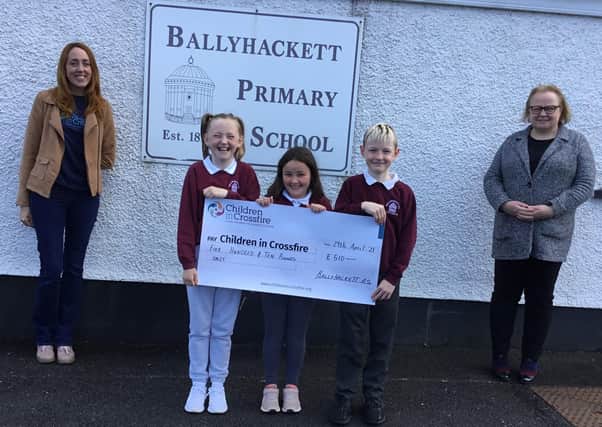 Ballyhackett Primary School in Castlerock, who raised £510 for  international development charity Children in Crossfire. Pictured with pupils from the school and Principal Grainne McIvar is Shauna O'Neill, Fundraising Co-ordinator. Children in Crossfire supports education and healthcare programmes for some of the most vulnerable children in the world, in Ethiopia and Tanzania
