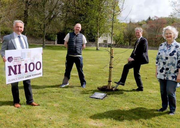 The Mayor of Causeway Coast and Glens Borough Council Alderman Mark Fielding plants a native oak tree at Cloonavin with Councillor William McCandless, Councillor Philip Anderson and Alderman Yvonne Boyle