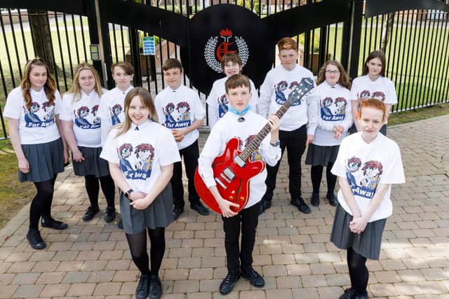 Glengormley High pupils wearing t-shirts designed by pupil Sienna Wilgaus .Pic by  Paul McIlwaine.