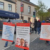 Placards citing Thomas Paine gathers at a rally against the Irish Sea customs border in Markethill on May 5, 2021.