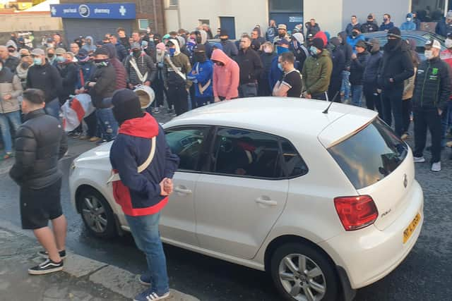 A crowd gathers at a rally against the Irish Sea customs border in Markethill on May 5, 2021.