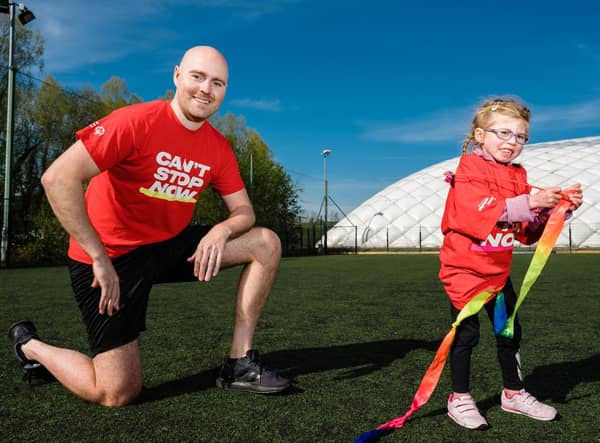 Sophia Sloan, aged 6, from Belfast is pictured with NI comedian Paddy Raff at the recent launch of the Special Olympics Collection Day fundraising appeal