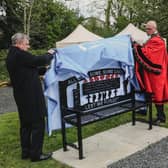 The, Mayor of Antrim and Newtownabbey, Councillor Jim Montgomery and Alderman Dr Fraser Agnew MBE unveiling the bench at Campbell Memorial Garden.