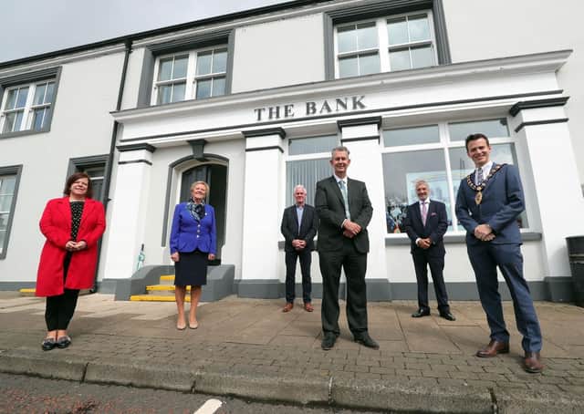 Pictured outside the old Northern Bank Building  is MEA LAG Chair, Kelli McRoberts; MEA LAG Vice Chair, Alderman Audrey Wales MBE; Portglenone Enterprise Group Director, Norman Worthington; National Lottery Heritage Fund,  Mukesh Sharma MBE; DAERA Minister, Edwin Poots and Mayor of Mid and East Antrim, Councillor Peter Johnston. The building has been converted into a community hub and office space by Portglenone Enterprise Group (PEG), which received almost £150,000 from the LEADER element of the Northern Ireland Rural Development Programme. Photo Kelvin Boyes/PressEye