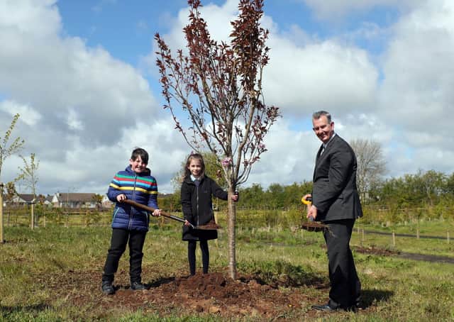 Ahoghill Nature Park received £230,000 from the LEADER element of the Northern Ireland Rural Development Programme for a contemplative garden area including two wildlife ponds surrounded by wetland planting and a fenced off children’s play park. Rory and Grace from Fourtown’s Primary School help Minister Poots plant a mature cherry tree at Ahoghill Nature Park. Photo Kelvin Boyes/PressEye
