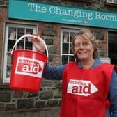 Rachel McCormick, founder and volunteer manager of The Changing Room, Christian Aid’s charity shop in the village of Garvagh, is leading a ‘walk with water’
