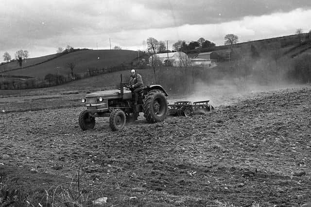 Pictured here during a busy week for farmers sowing barley at the end of April 1980 is Co Down farmer Tony Rice of Cargary, Jerrettspass, Newry, Co Down, discing barley ground. Picture: News Letter archives