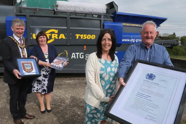 Dr Mark McKinney and Jacqui McKinney from the ATG Group display the Queen’s Award for Sustainable Development alongside the Mayor of Causeway Coast and Glens Borough Council Alderman Mark Fielding and the Mayoress Mrs Phyllis Fielding