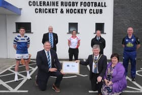 The Mayor of Causeway Coast and Glens Borough Council Alderman Mark Fielding and Mayoress Mrs Phyllis Fielding present a framed certificate to Andrew Hutchinson, President of Coleraine Rugby Football, Cricket and Hockey Club, to mark the club’s centenary along with Matt Smyth, Brian Reid, Gerry Lafferty, Susan Humphrey and Stephen McCartney