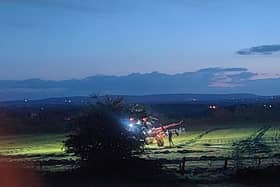 Ballymoney Times reader Paul Mullan's photo of local farmers working hard into the night