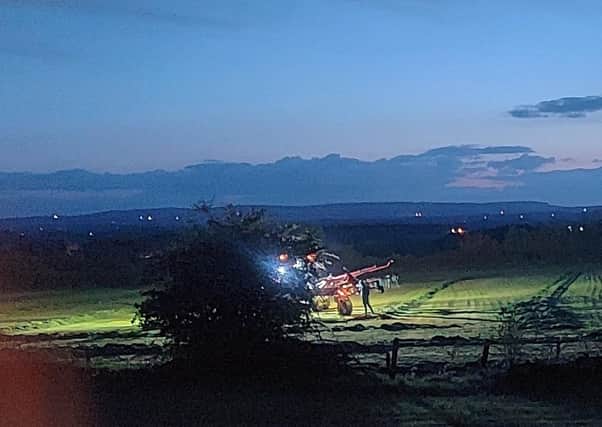 Ballymoney Times reader Paul Mullan's photo of local farmers working hard into the night