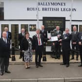 Members of Ballymoney Royal British Legion receive a framed Coat of Arms from the Mayor of Causeway Coast and Glens Borough Council Alderman Mark Fielding and Mayoress Mrs Phyliss Fielding in recognition of its receipt of the Queen’s Award for Voluntary Service