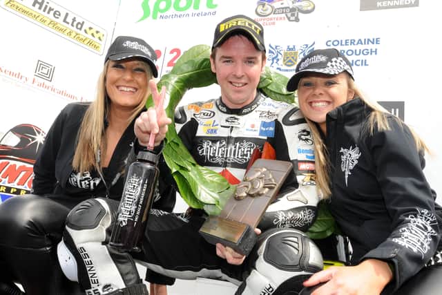 Alastair Seeley celebrates victory at the 2010 North West 200.