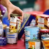 Donations are made at the launch of the Tesco Food Collection.