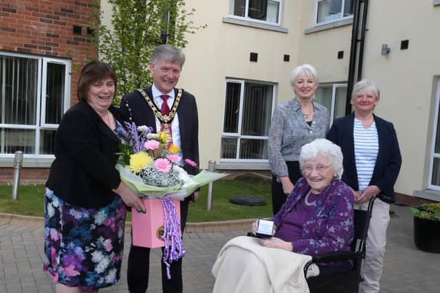 Mayor of Causeway Coast and Glens Borough Council Alderman Mark Fielding and the Mayoress Mrs Phyliss Fielding present Edith Gilmore from Aghadowey with her centenary coin. Also pictured are Edith’s daughters Mary Platt and Alison Cromie. Edith celebrated her 100th birthday on April 16