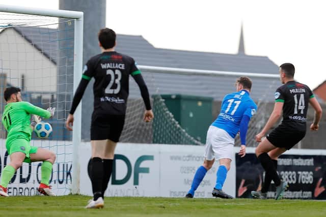 Andy Hall kicks off the scoring for Glenavon in last night's defeat of Warrenpoint Town. Pic by Pacemaker.