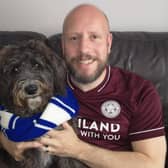 News Letter journalist Graeme Cousins with the latest recruit to the Northern Ireland Leicester City fan club - his dog Shadow