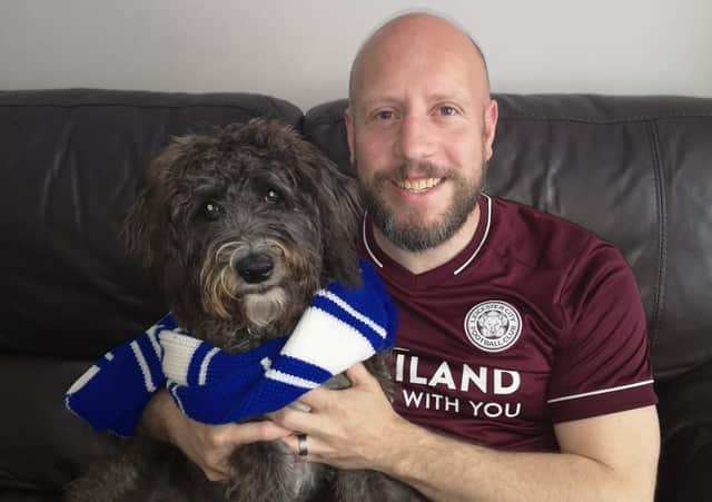 News Letter journalist Graeme Cousins with the latest recruit to the Northern Ireland Leicester City fan club - his dog Shadow