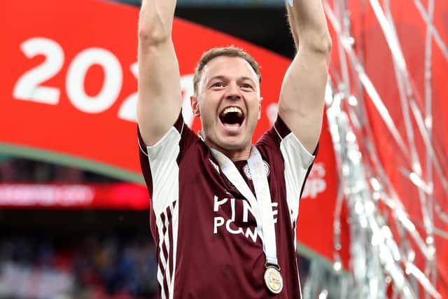 Leicester City's Jonny Evans celebrates with the trophy after the Emirates FA Cup Final at Wembley Stadium, London. Picture date: Saturday May 15, 2021.