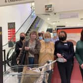 Customers Janice and Elizabeth Beckinsale with staff  members of Debenhams in Ballymena  as it closed its doors for the final time.